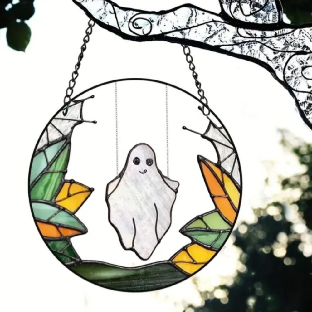Spook Up Your Home with this Plastic Halloween Ghost on a swing Suncatcher!